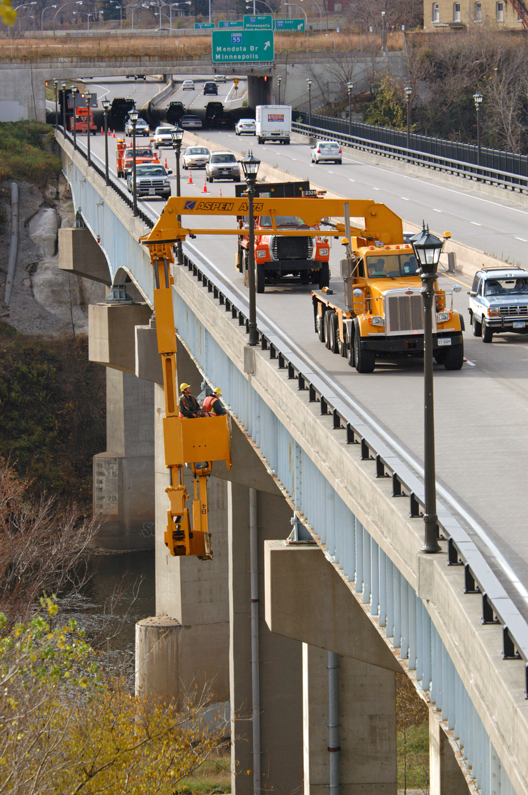 Bridge inspectors inspecting a bridge