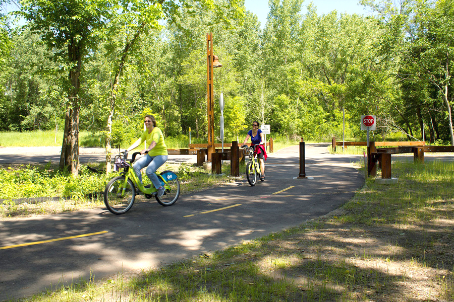 Bicyclists biking along a path