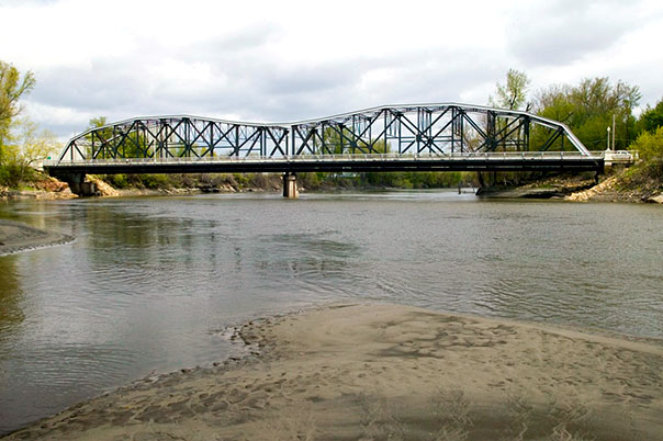 Recent photo of Hwy 99 Bridge from Minnesota river with low water levels.