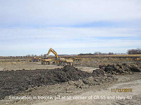 Excavation in borrow pit at SE corner of County Road 55 and Highway 40