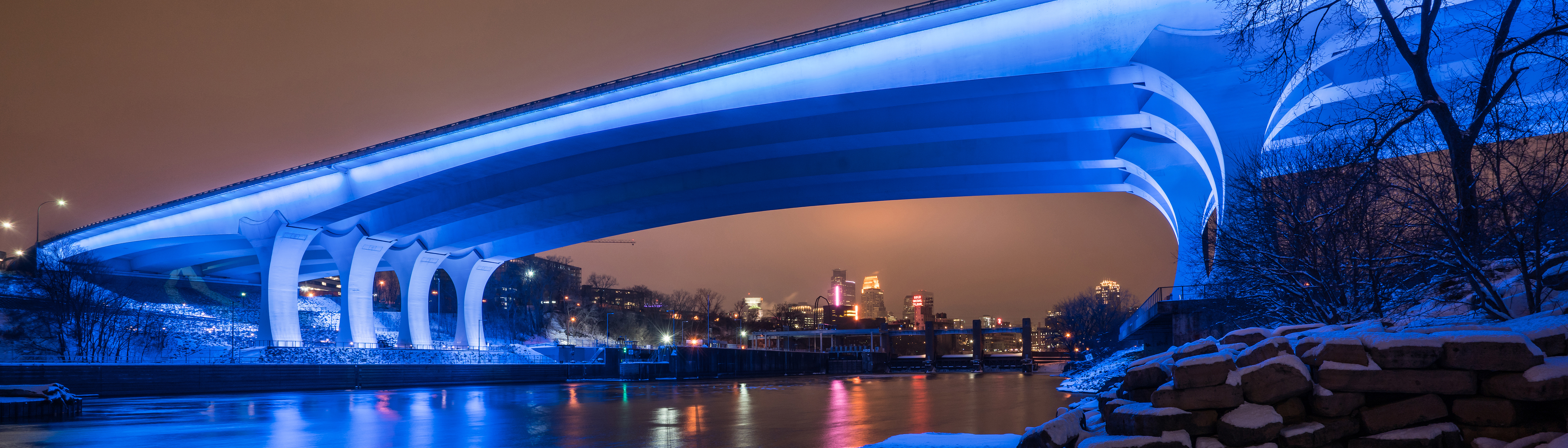 I-35W St. Anthony Falls Bridge lit blue