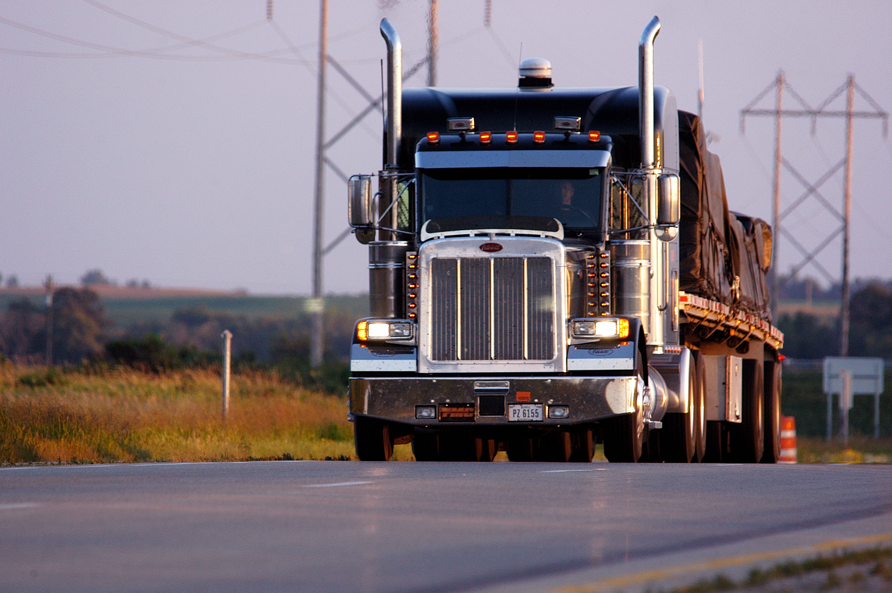 Freight truck travelling on the highway.