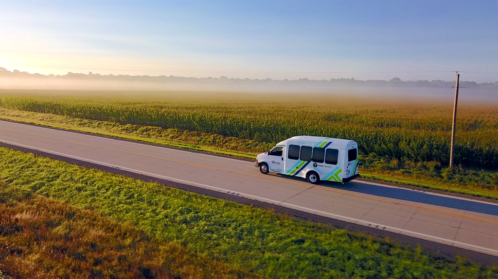 Accessible van traveling on a rural highway