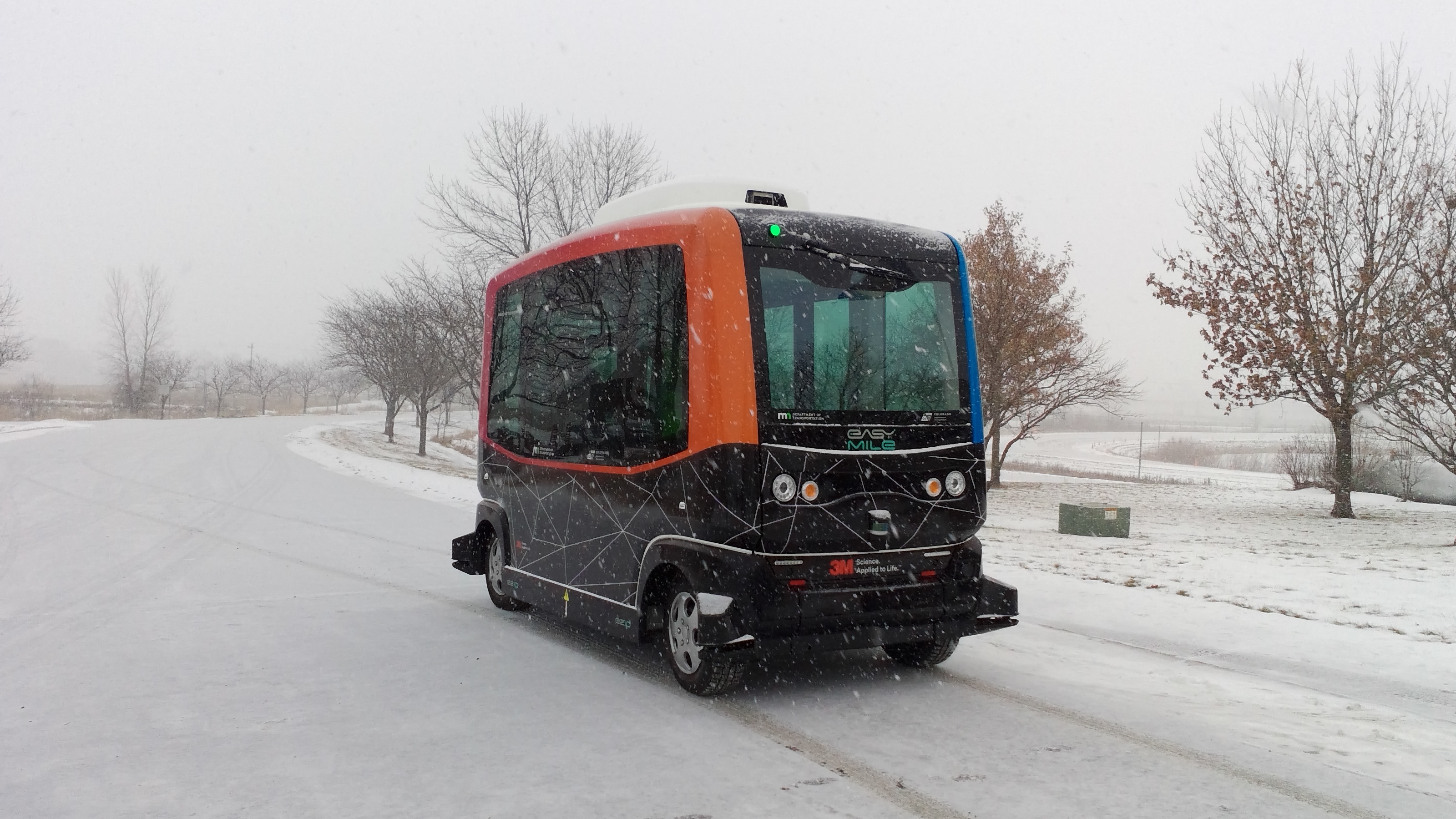 shuttle bus operating in snow