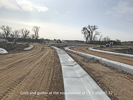 Curb and gutter at the roundabout at County Road 5 and US 12