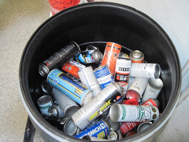 Barrel of hazardous spray cans
