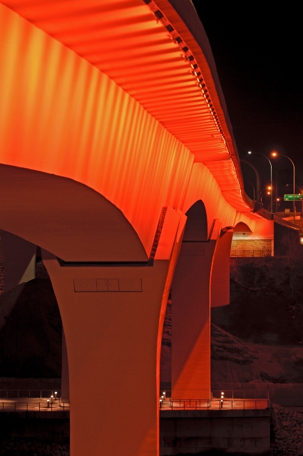 I-35W bridge lit up with orange light