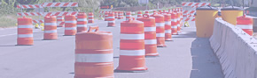 Orange barrels on a highway