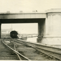 The bridge was designed to accommodate elevated rail tracks, supporting the intensive industrial activity along the river. View is where West River Parkway is today