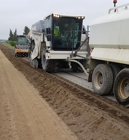 adding cement to the gravel base