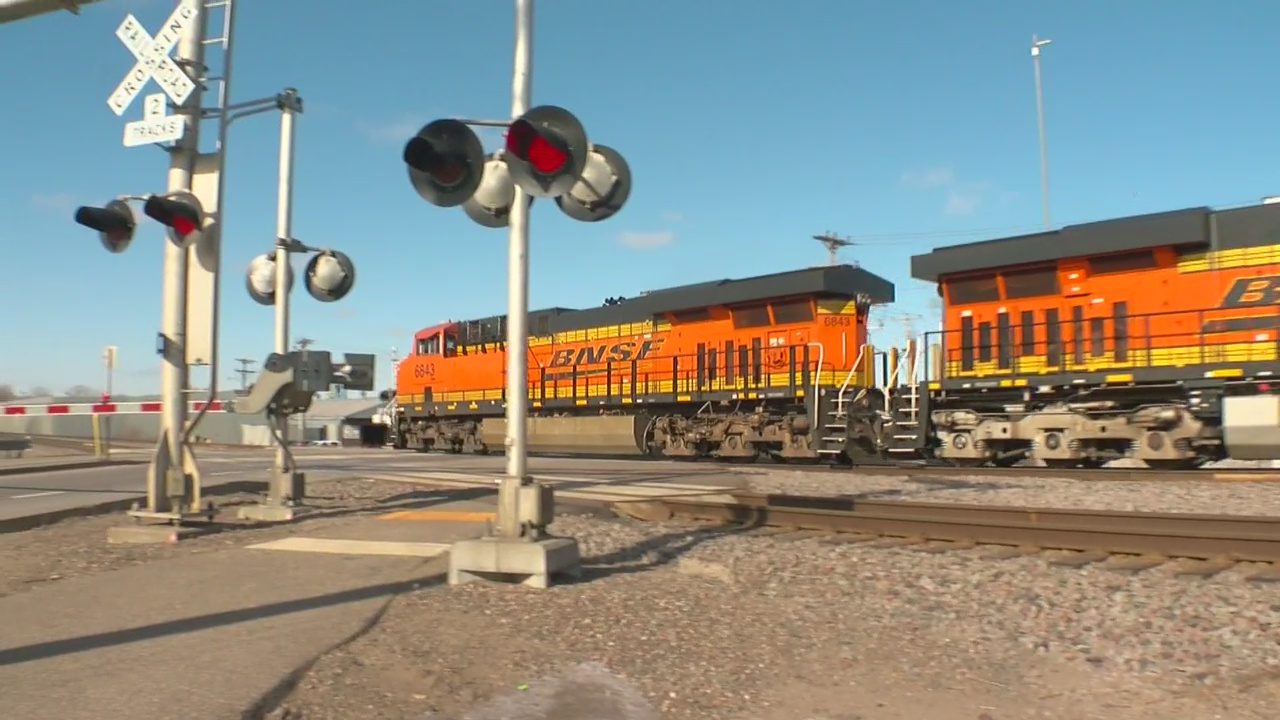 BNSF train crossing an intersection