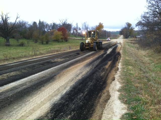 Research Using Waste Shingles for Stabilization or Dust Control for Gravel Roads and Shoulders