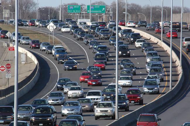 A highway crowded with vehicles
